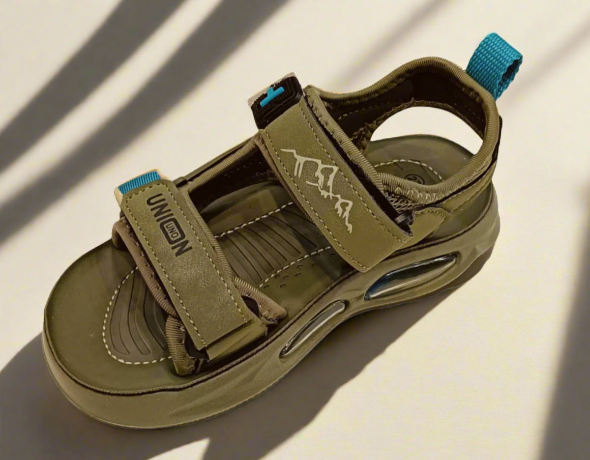 olive colour sandal with blue straps on a white background