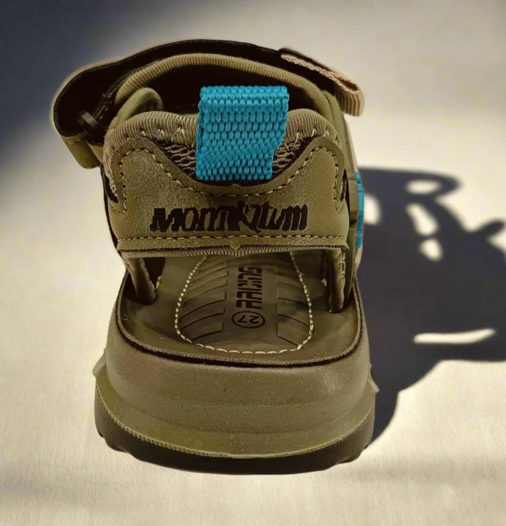 Brown sandal with blue strap on a white background