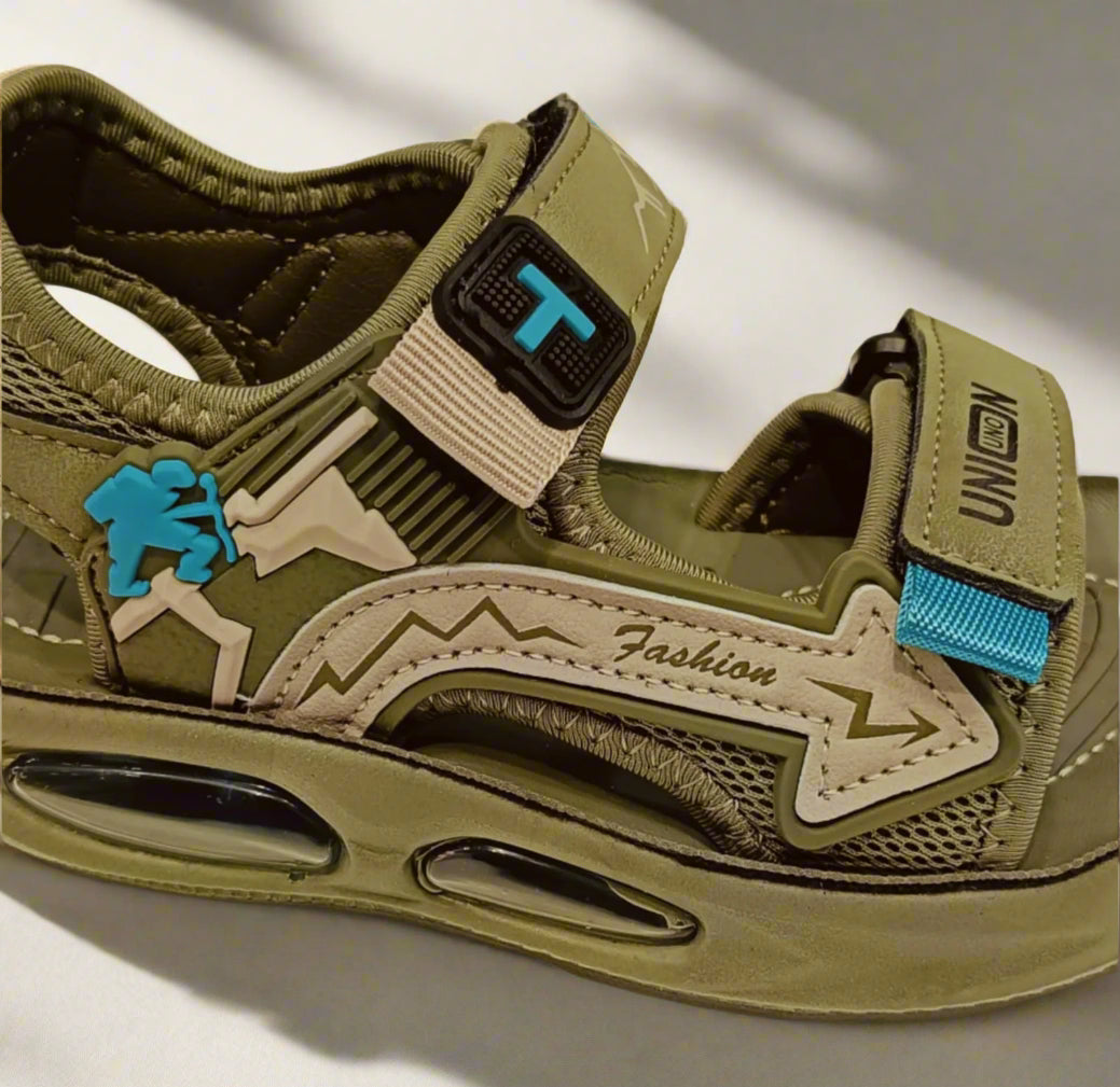 Green sandal with blue accents on a white background