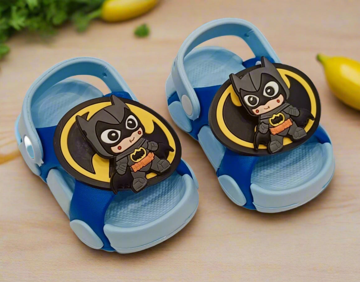 Pair of blue sandals with Batman character on a white background
