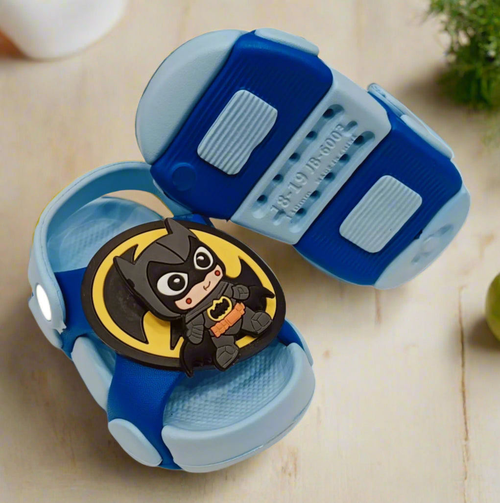 Blue children's sandals with a Batman logo on a white background