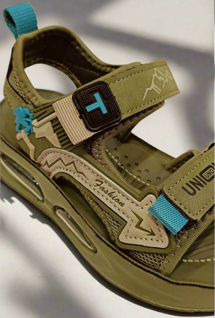 Brown sandal with blue accents on a white background